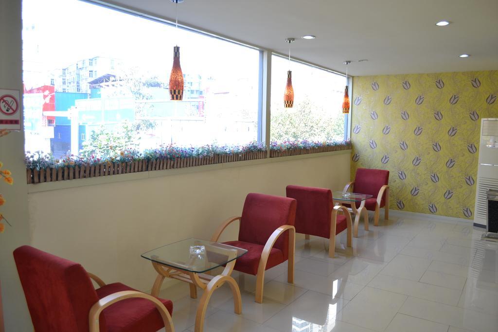 Qingdao Renjia Bussiness Hotel Kamer foto