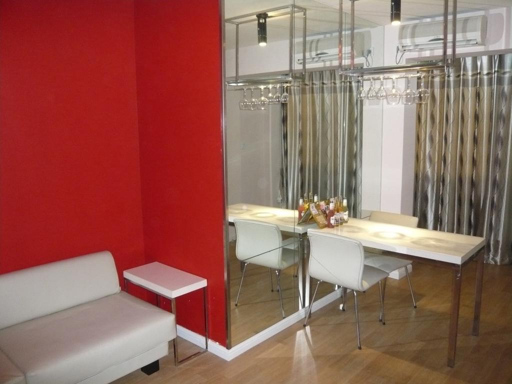 Qingdao Renjia Bussiness Hotel Kamer foto