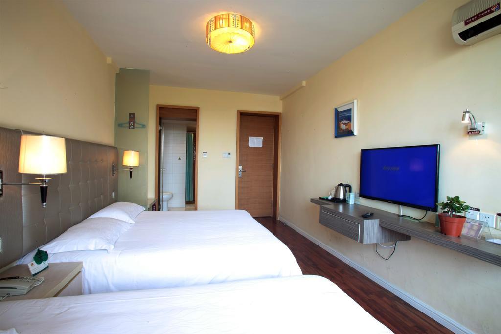 Qingdao Renjia Bussiness Hotel Buitenkant foto