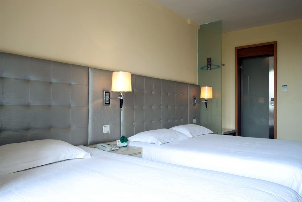 Qingdao Renjia Bussiness Hotel Buitenkant foto