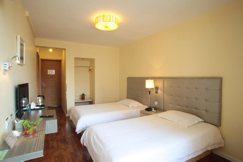 Qingdao Renjia Bussiness Hotel Buitenkant foto