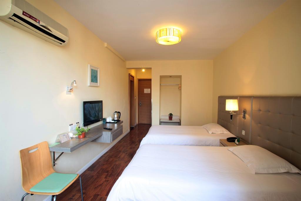 Qingdao Renjia Bussiness Hotel Buitenkant foto